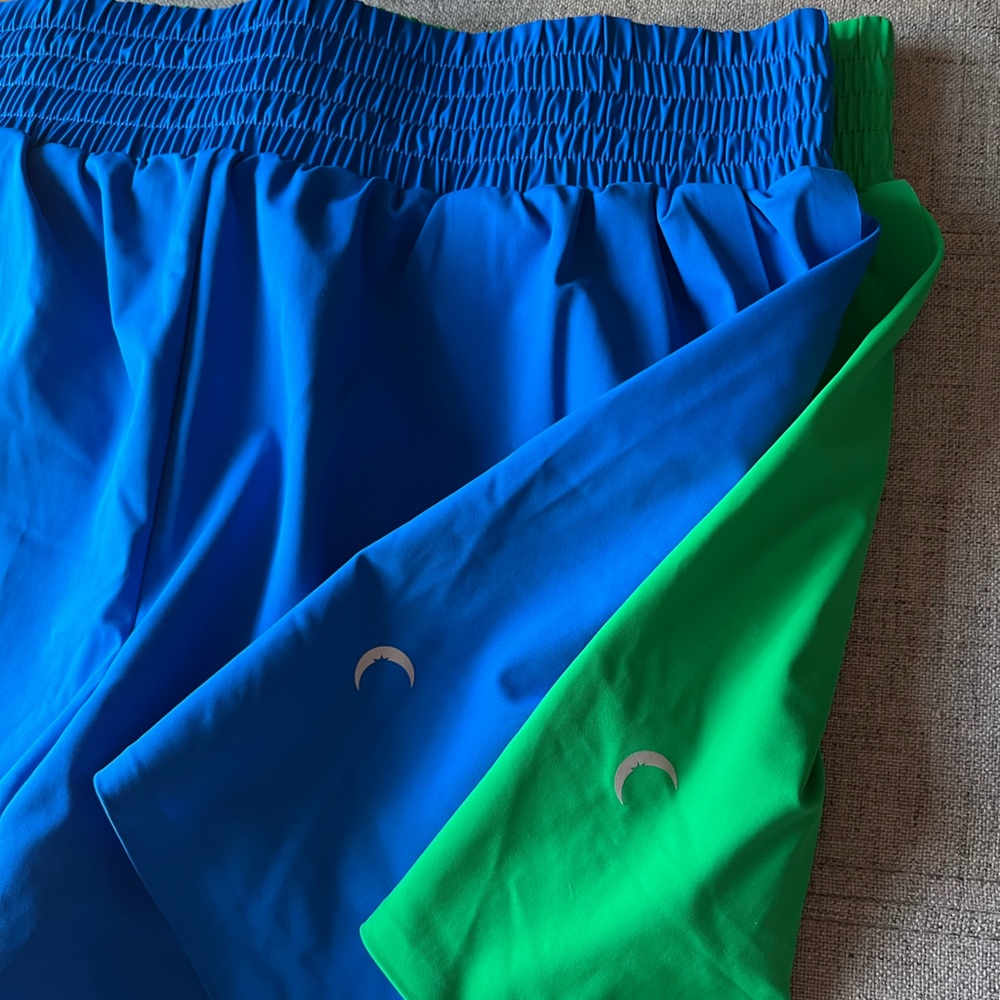 Lot of 2 pairs of Zyia Finesse athletic shorts in blue and green size 8-10 L
